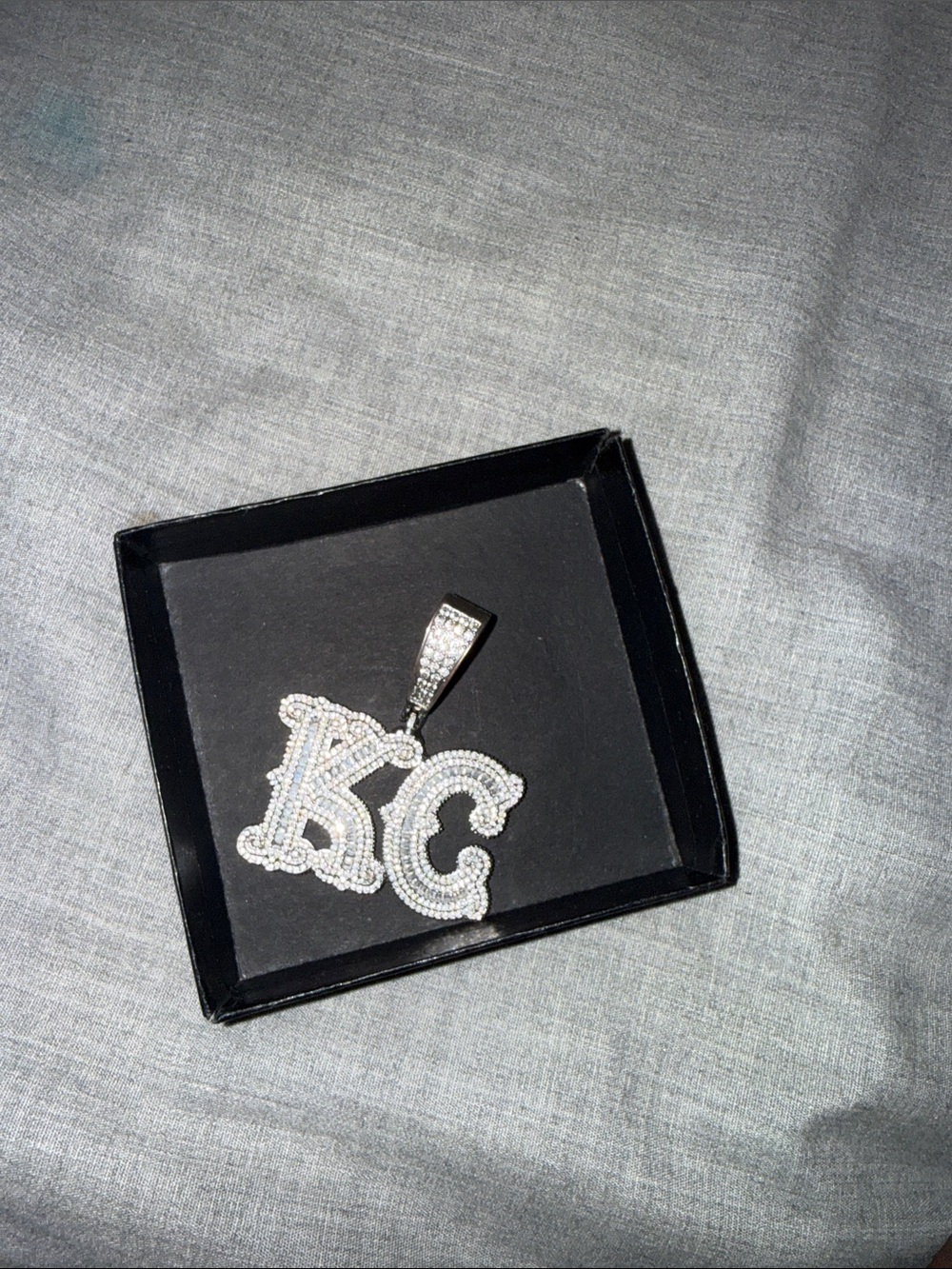 Iced out Mossianite “KC” Pendant